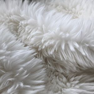 Reserved White throw